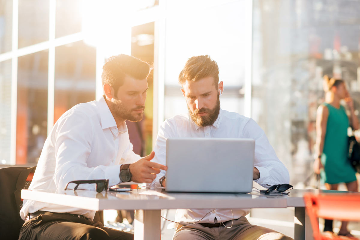 Two young bearded caucasian modern business man sitting in a bar | Grooming Tips To Make Your Hair Look Thicker and Fuller | what can i do to make my hair thicker